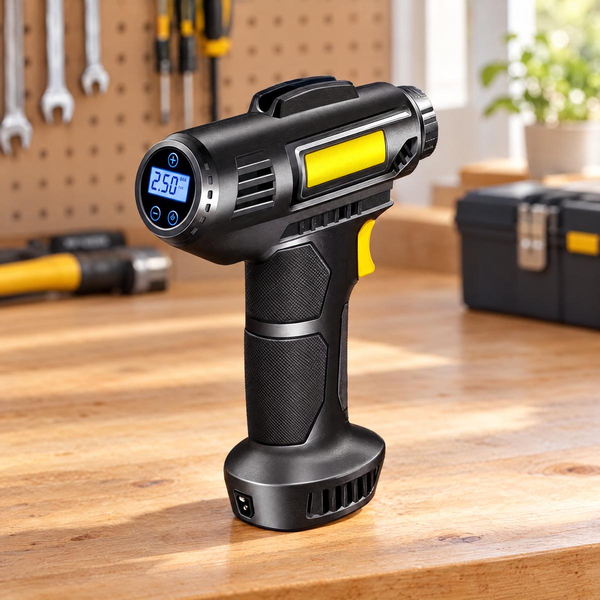 Portable tire inflator on a garage workbench